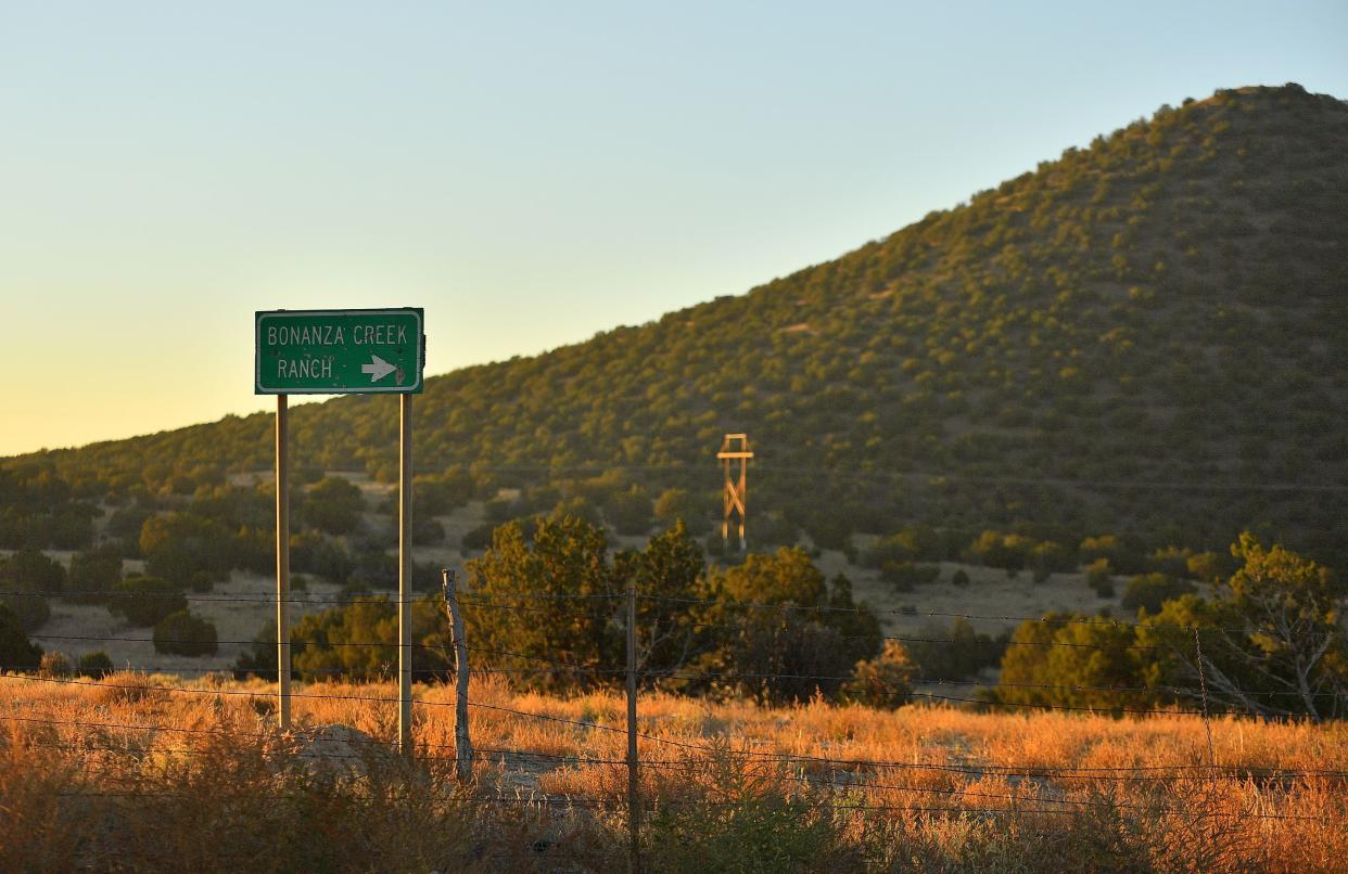 A sign points to the direction of the Bonanza Creek Ranch where a fatal shooting occurred on a movie set on October 22, 2021 in Santa Fe, New Mexico.