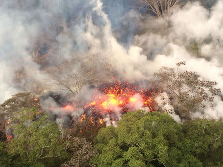 Lava spattering area from an area between fissures 16 and 20 is seen in Hawaii, U.S. May 16, 2018. Picture taken on May 16, 2018. USGS/Handout via REUTERS