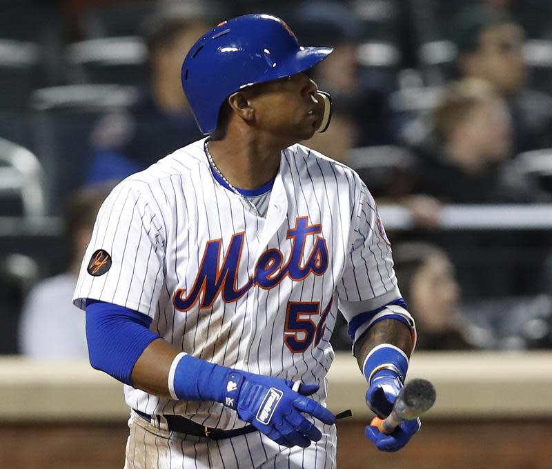 Is golf the answer to Yoenis Cespedes early-season slump? The Mets outfielder suggests it could be. (AP)