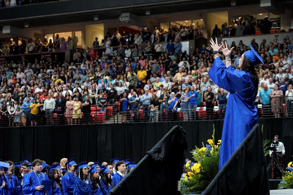 Albri Ballinger signs the National Anthem during Frenship High School's 2023 spring commencement ceremony Sunday, May 28, at the United Supermarkets Arena.