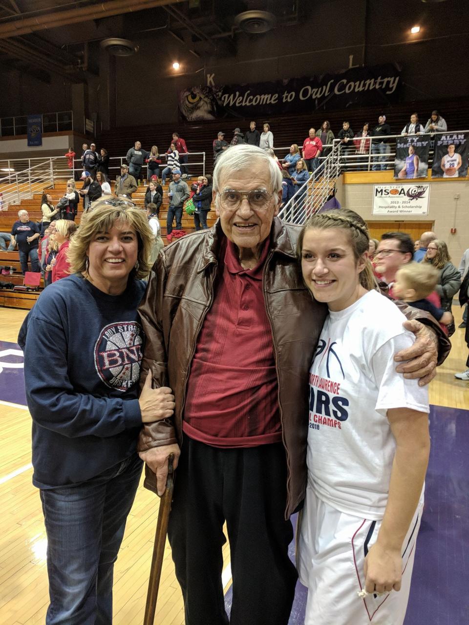 Three generations of Pritchetts involved with the BNL girls basketball program are shown with Kristin (left), Pete and McKenzie (right) posing after a Lady Stars sectional title at Seymour.