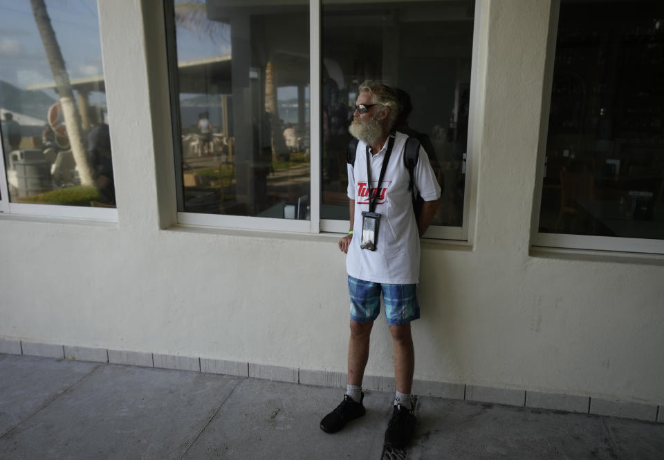 Timothy Shaddock, the Australian sailor who spent months adrift in the Pacific Ocean before being rescued by a Mexican tuna boat, waits to give an interview at a hotel in Manzanillo, Mexico, Wednesday, July 19, 2023. Shaddock and his dog left northwest Mexico in a catamaran in late April, he said, planning to sail to French Polynesia, but a few weeks into his voyage, he was struck by a storm, which disabled his catamaran and left him with no electronics and no way to cook. They survived by fishing and drinking rain water. (AP Photo/Fernando Llano)