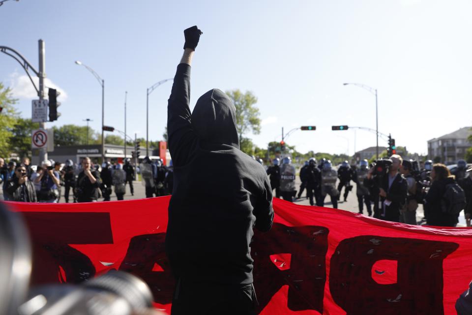 <p>A demonstrator raises his fist during the G7 Summit in Quebec City, Quebec, Canada, June 8, 2018. (Photo: Mathieu Belanger/Reuters) </p>