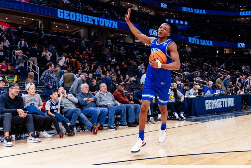 Xavier guard Quincy Olivari celebrates the Musketeers' 98-93 win over Georgetown at Capital One Arena in Washington D.C. on Saturday, March 2, 2024.