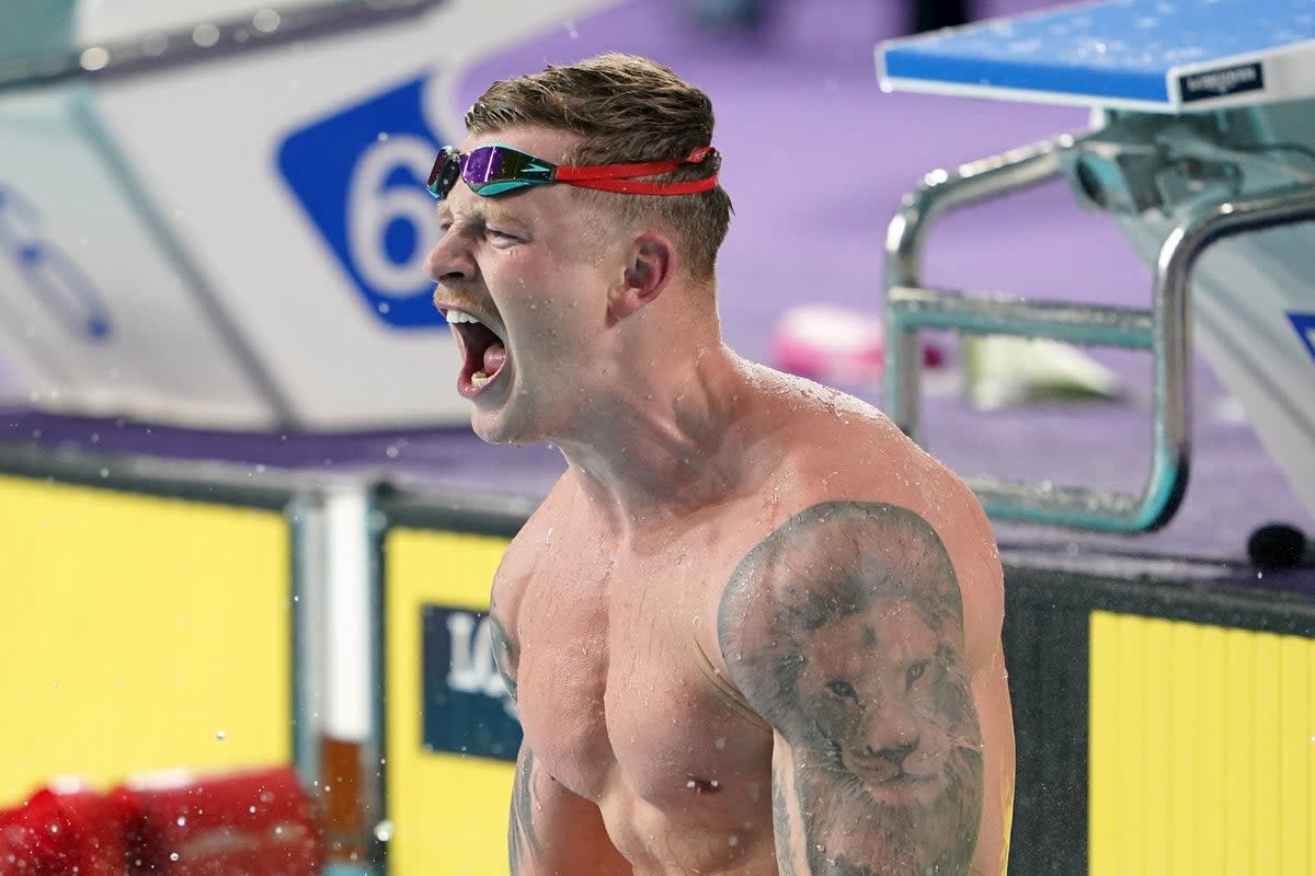 Redemption: Adam Peaty celebrates winning gold in the 50m breaststroke at the Commonwealth Games  (PA)