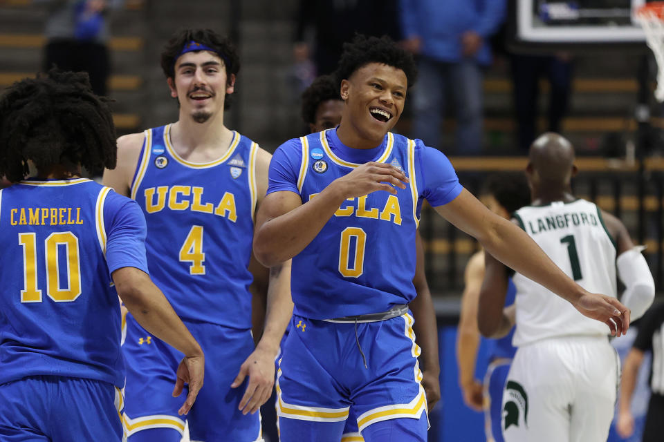 WEST LAFAYETTE, INDIANA - MARCH 18: Jaylen Clark #0 of the UCLA Bruins celebrates with teammates after defeating the Michigan State Spartans in the First Four game prior to the NCAA Men's Basketball Tournament at Mackey Arena on March 18, 2021 in West Lafayette, Indiana. (Photo by Gregory Shamus/Getty Images)