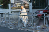 Pray for Nice: An elderly man reflects at the scene of a terror attack on the Promenade des Anglais in Nice, where a French-Tunisian attacker killed 84 people as he drove a lorry through crowds, during the Bastille Day celebrations. 