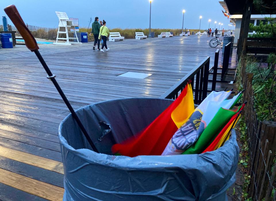 An umbrella is one casualty of the winds in Rehoboth Beach as tropical storm Ophelia hits the Delaware coast early Saturday evening, Sept. 23, 2023.