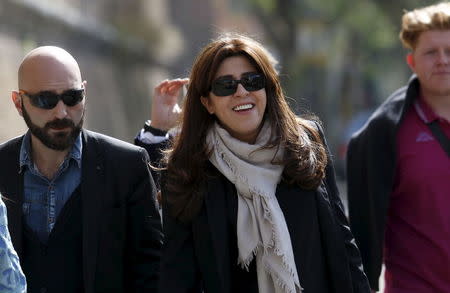 Italian laywoman Francesca Chaouqui (C) walks to her her trial at the Vatican, in Rome April 6, 2016. REUTERS/Remo Casilli