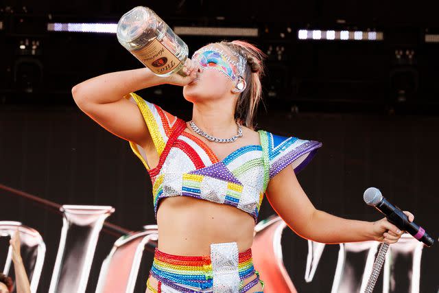 <p>Christopher Polk/Variety via Getty</p> JoJo Siwa performs onstage at 2024's LA Pride in the Park concert