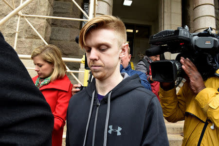 Ethan Couch is surrounded by members of the press after being released from the Tarrant County Jail in Fort Worth, Texas, U.S., April 2, 2018. REUTERS/Nick Oxford