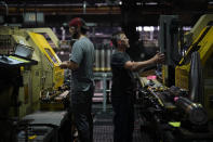 Steel workers manufactures 155 mm M795 artillery projectiles at the Scranton Army Ammunition Plant, Tuesday, Aug. 27, 2024, in Scranton, Pa. (AP Photo/Matt Slocum)