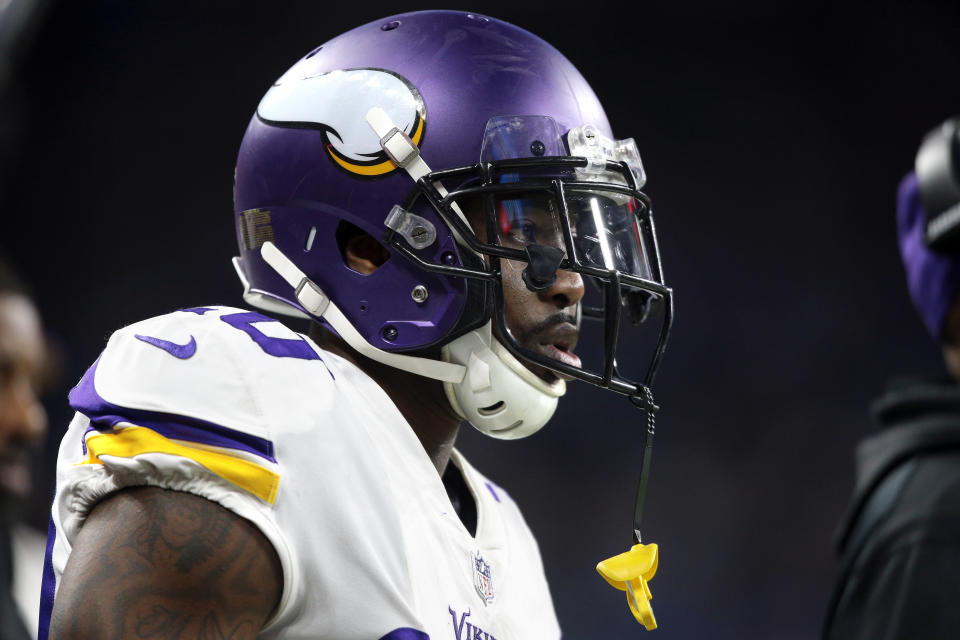 A side view of Mackensie Alexander looking ahead while wearing a Vikings helmet.