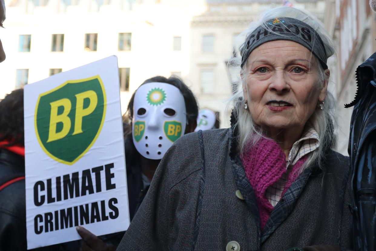 British designer Vivienne Westwood, (R) and her son activist and businessman Joe Corré gesture during a protest action to highlight the exploitation of the West Papua rainforest and the continued presence of BP, outside the headquarters of BP in London, on Oct. 18, 2019. (Photo: Isabel Infantes/AFP) 