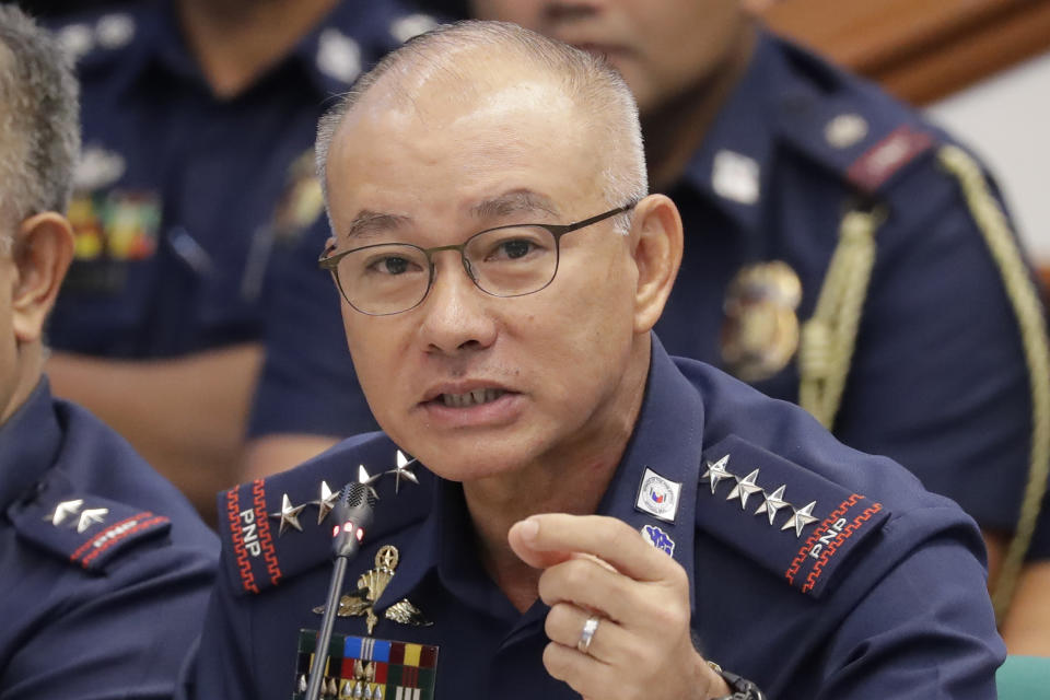 FILE - In this Oct. 3, 2019, file photo, Philippine National Police chief Gen. Oscar Albayalde gestures as he testifies at the resumption of the Senate probe on the release of hundreds of convicts under the shortened serving of their sentence for good behavior, in suburban Pasay city, south of Manila, Philippines. Albayalde has resigned after he faced allegations in a Senate hearing that he intervened as a provincial police chief in 2013 to prevent his officers from being prosecuted for allegedly selling a huge quantity of seized drugs. (AP Photo/Bullit Marquez, File)