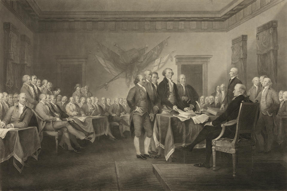 This image shows an 1876 engraving titled "Declaration of Independence, July 4th, 1776" made available by the Library of Congress. On that day, the Continental Congress formally endorsed the Declaration of Independence. Celebrations began within days: parades and public readings, bonfires and candles and the firing of 13 musket rounds, one for each of the original states. Nearly a century passed before the country officially named its founding a holiday. ( J. Trumbull, W.L. Ormsby via AP)