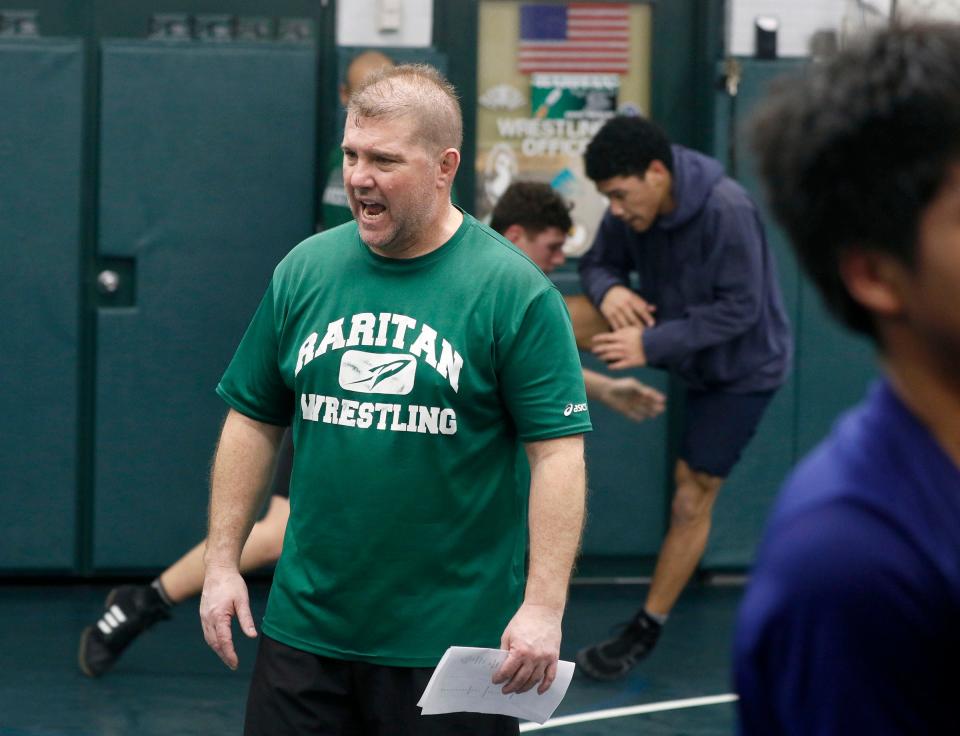 Raritan High School head wrestling coach Rob Nucci runs drills with his team this past Thursday afternoon.  It is his final season and his final regular season home match was Friday night.