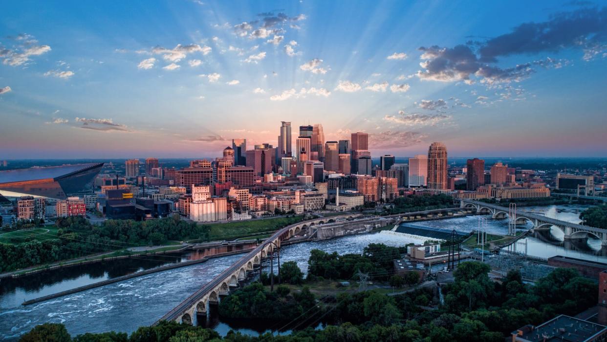 Minneapolis and Stone Arch Bridge at Sunrise.