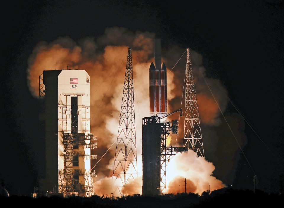 A Delta IV rocket, carrying the Parker Solar Probe, lifts off from launch complex 37 at the Kennedy Space Center, Sunday, Aug. 12, 2018, in Cape Canaveral, Fla. The Parker Solar Probe will venture closer to the Sun than any other spacecraft and is protected by a first-of-its-kind heat shield and other innovative technologies that will provide unprecedented information about the Sun. (AP Photo/John Raoux)