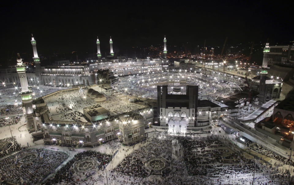 Pilgrims pray at the Grand Mosque