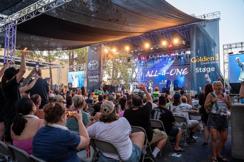 The crowd sings along to All-4-One’s performance on the Golden 1 Stage during the California State Fair at Cal Expo on Friday.