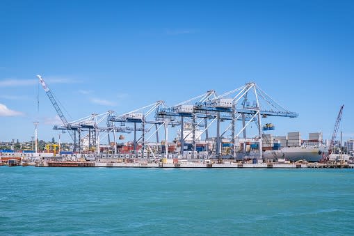 Shipping port with containers and cranes