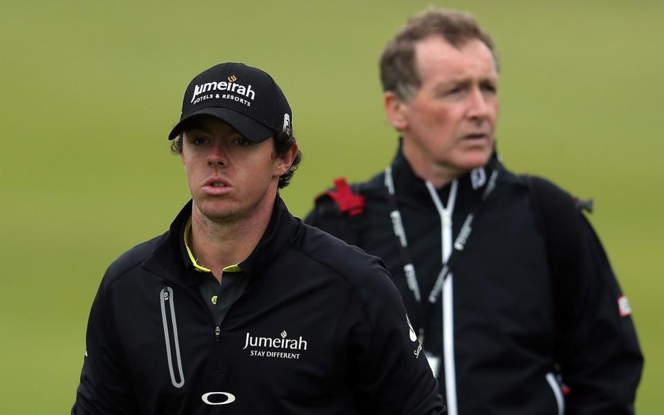 Rory McIlroy of Northern Ireland with his coach Michael Bannon during practice for the 2012 Irish Open  - Getty Images