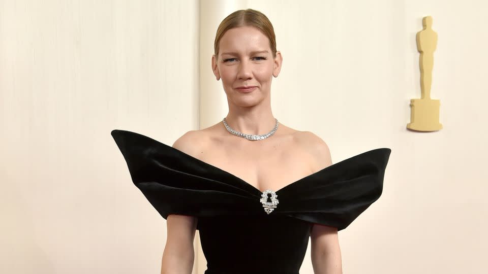 Best Actress nominee Sandra Hüller paired a structural custom Schiaparelli gown with Cartier jewelry. - Richard Shotwell/Invision/AP