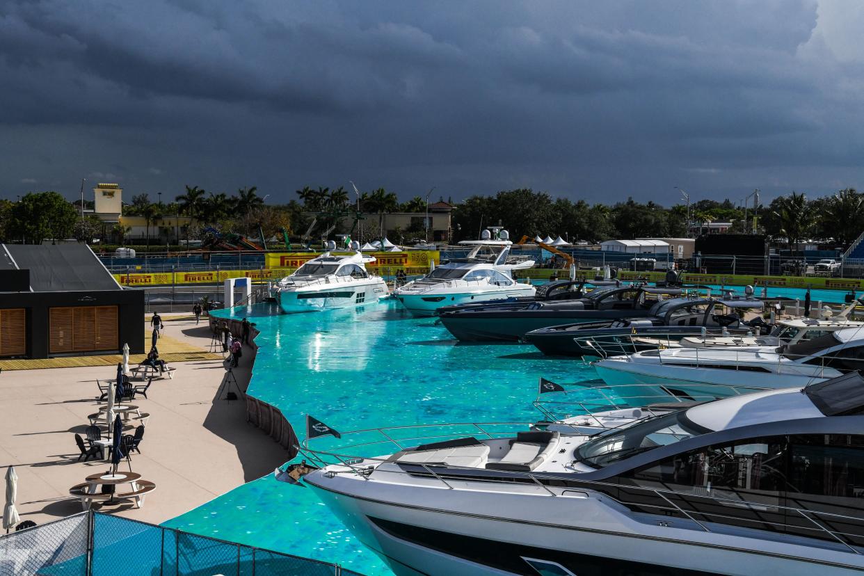 Yachts are parked on fake waters at a visitor stand near the Formula One track ahead of the Miami Grand Prix in Miami Gardens, Florida on May 4, 2022. (Photo by CHANDAN KHANNA / AFP) (Photo by CHANDAN KHANNA/AFP via Getty Images)