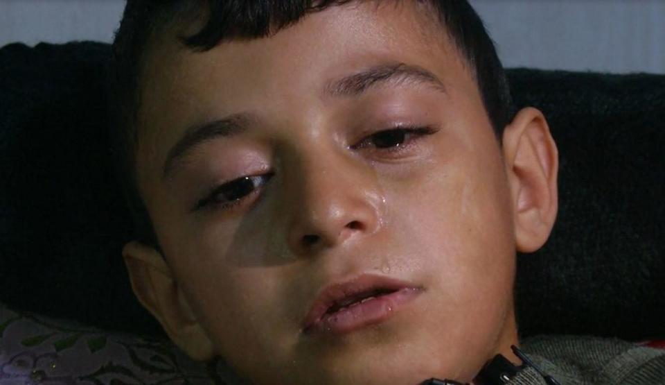 Mohammad Hamad, 9, cries in a hospital bed in Deir al-Balah, northern Gaza, Feb. 28, 2024, after being the only member of his immediate family to survive an Israeli strike that hit their home several miles further north in Neseirat. / Credit: CBS News