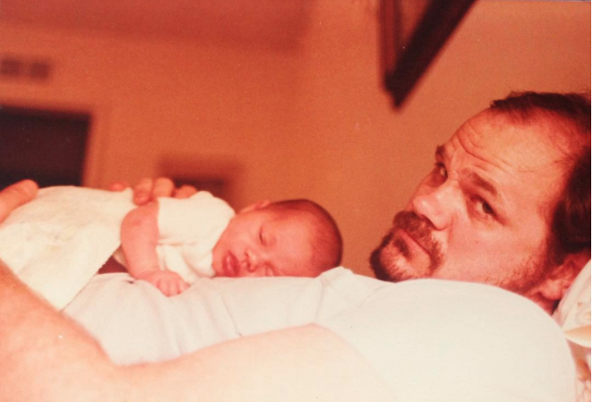 Thoms Markle holding a baby meghan markle