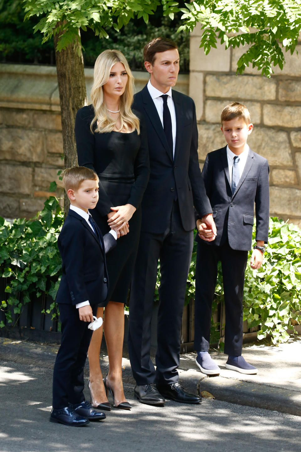 Ivanka Trump and Jared Kushner with their sons Theo and Joseph Kushner at the funeral of Ivana Trump. - Credit: John Lamparski/Getty Images