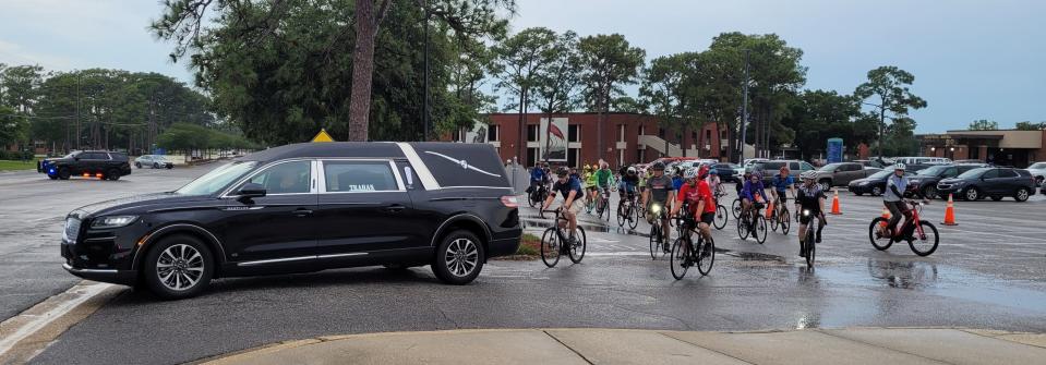 The West Florida Wheelman bicycling club hosted a Ride of Silence on May 17, to raise awareness about bicycle safety and the numbers of cyclists killed or injured. Trahan Funeral led the procession with a hearse, which started from Pensacola State College.