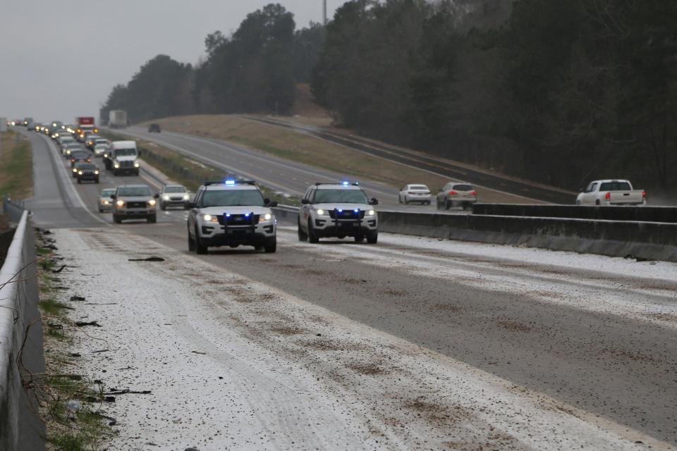 MDOT maintenance crews treat bridges on I-55 southbound in Hinds County on Sunday.