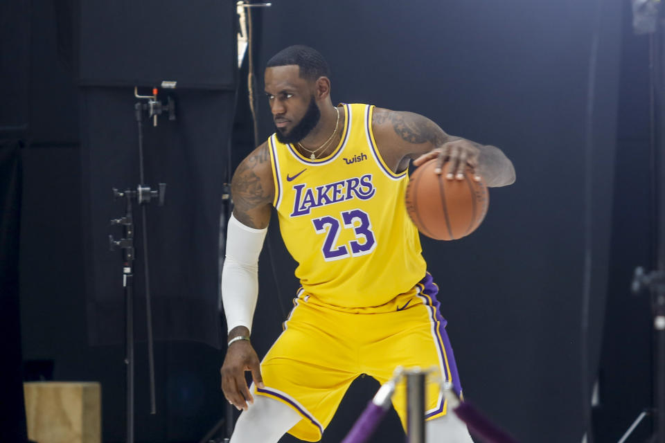 Los Angeles Lakers forward LeBron James poses for photos during the NBA basketball team's media day in El Segundo, Calif., Friday, Sept. 27, 2019. (AP Photo/Ringo H.W. Chiu)