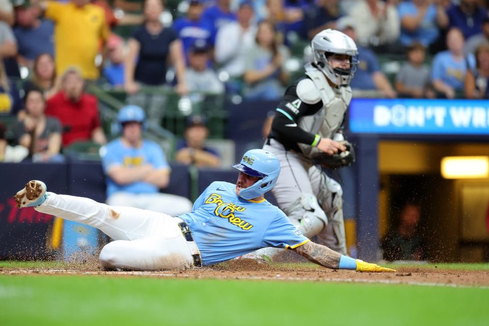 Joey Ortiz of the Milwaukee Brewers scores during the sixth inning against the Arizona Diamondbacks on Sunday at American Family Field.