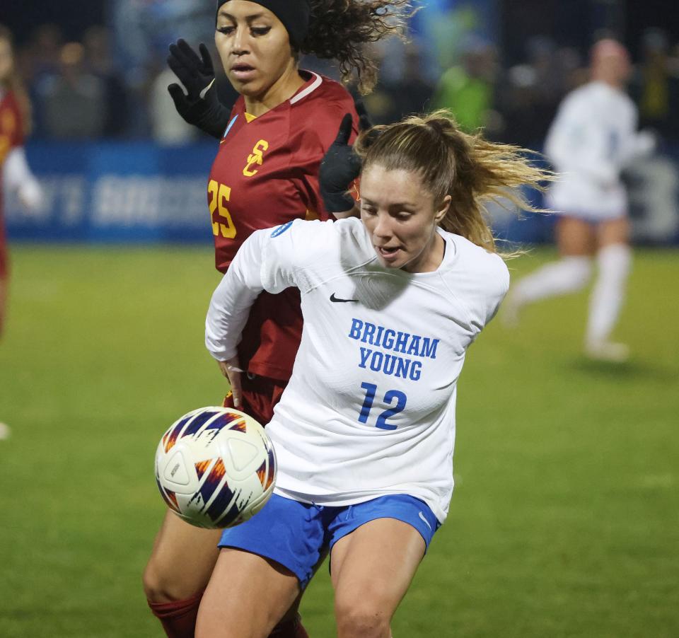 BYU midfielder Jamie Shepherd (12) and USC midfielder Aaliyah Farmer (25) compete during the second round of the NCAA championship in Provo on Thursday, Nov. 16, 2023. BYU won 1-0. | Jeffrey D. Allred, Deseret News