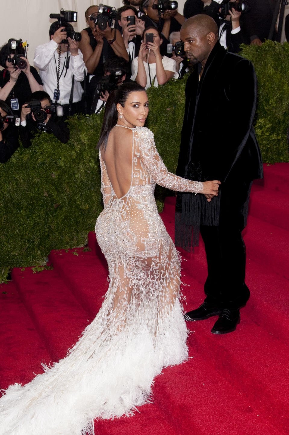 Kim Kardashian West and Kanye West attend "China: Through the Looking Glass" 2015 Costume Institute Benefit Gala - red carpet arrivals at the Metropolitan Museum of Art in New York City. �� LAN (Photo by Lars Niki/Corbis via Getty Images)