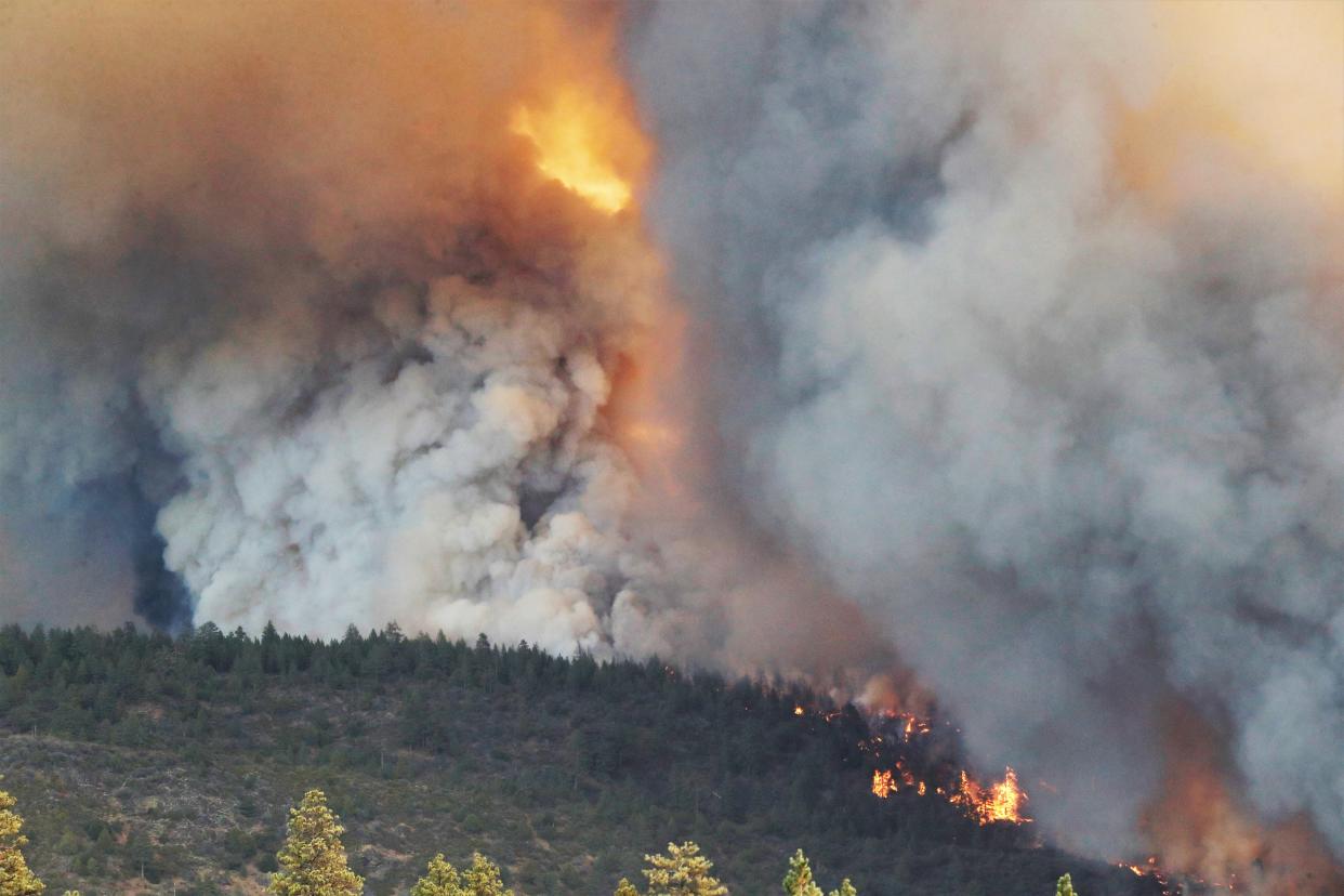 Smoke and flames billow into the air from the Dixie Fire in California on Sept. 9, 2021.