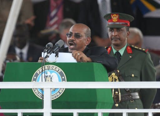 The President of Sudan Omar al Bashir addresses a crowd of thousands during a ceremony in the capital Juba to celebate South Sudan's independence. Bashir said it was the joint responsibility of both nations to build confidence and reach agreement on outstanding issues that were not resolved before partition