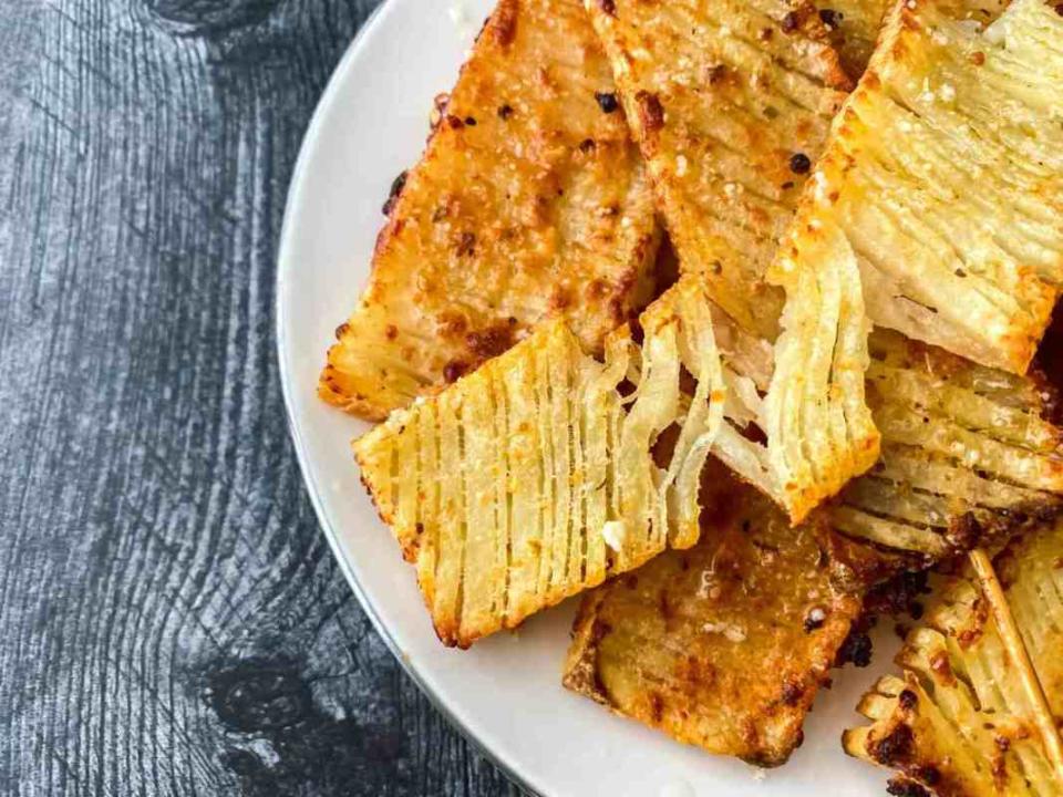 <p>In A Pinch</p><p>These potatoes are the most mouth-watering thing I've seen on TikTok yet. There is no doubting why these are viral sensations.</p><p><strong>Get the recipe: <a href="https://madeinapinch.com/crispy-garlic-parm-accordion-potatoes-tiktok-viral-recipe" rel="nofollow noopener" target="_blank" data-ylk="slk:Crispy Garlic Parm Accordion Potatoes;elm:context_link;itc:0;sec:content-canvas" class="link ">Crispy Garlic Parm Accordion Potatoes</a></strong></p><p><strong>Related: <a href="https://www.yahoo.com/lifestyle/35-foolproof-set-forget-crock-164443300.html" data-ylk="slk:35 Best Crock Pot Potato Recipes;elm:context_link;itc:0;sec:content-canvas;outcm:mb_qualified_link;_E:mb_qualified_link;ct:story;" class="link  yahoo-link">35 Best Crock Pot Potato Recipes</a></strong></p>