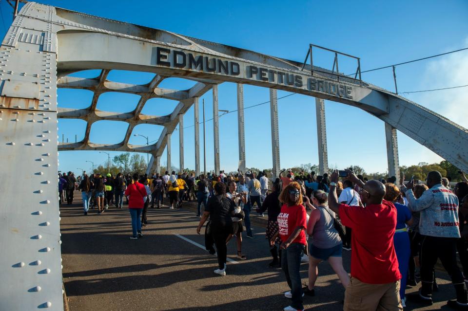 Marchers cross the bridge during the 58th anniversary of the Selma to Montgomery March at the Edmund Pettus Bridge in Selma, Ala., on Sunday, March 5, 2023. 