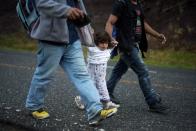 Hondurans take part in a caravan of migrants heading toward the U.S., in Chiquimula