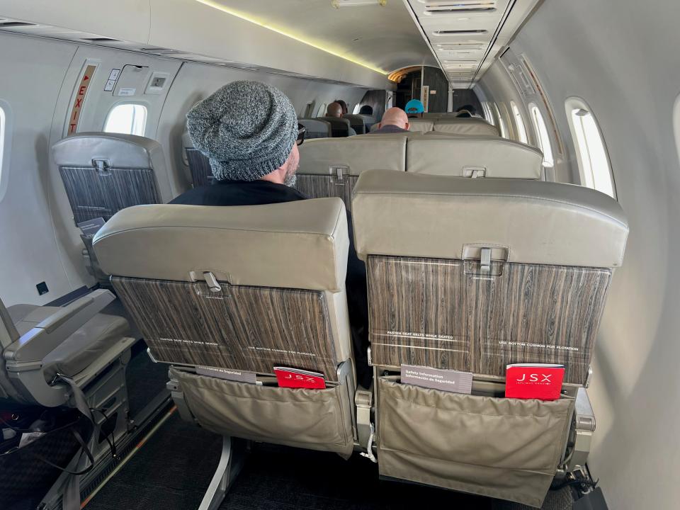 An interior, forward-facing view of the JSX cabin from the author's seat.