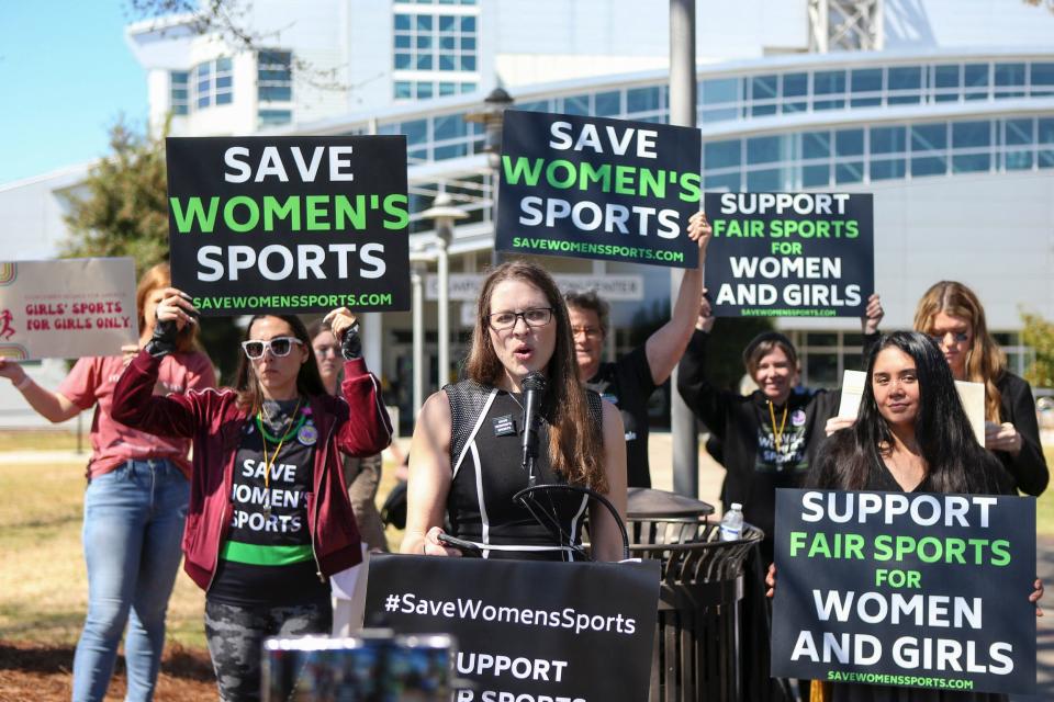 Protesters gather in Atlanta as Thomas competes at NCAA Championships.