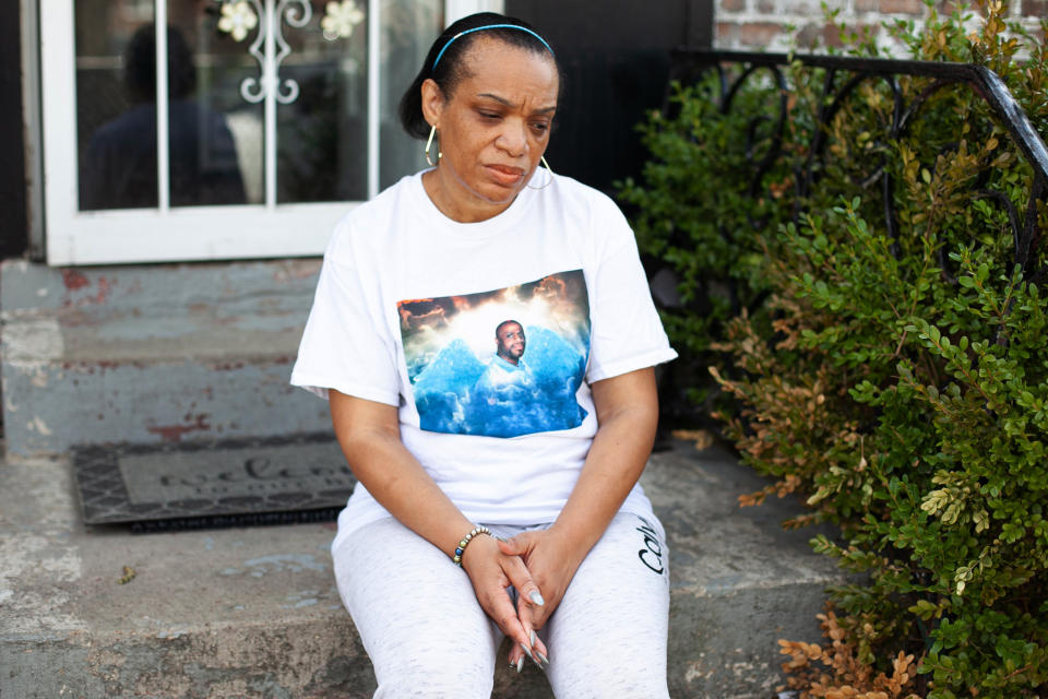 Image: Angela McMiller outside her home in Chicago (Eddie Quinones / for NBC News)