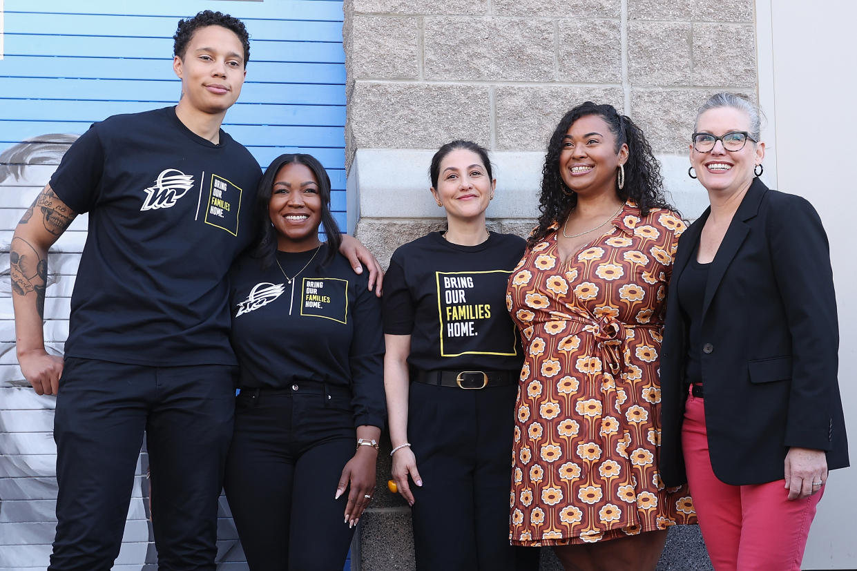 (From left) Brittney Griner, wife Cherelle Griner, Neda Sharghi, artist Antoinette Cauley and Arizona Governor Katie Hobbs pose together alongside the 