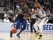 Mar 24, 2019; San Jose, CA, USA; Liberty Flames guard Lovell Cabbil Jr. (3) drives to the basket against Virginia Tech Hokies guard Ahmed Hill (13) during the first half in the second round of the 2019 NCAA Tournament at SAP Center. Mandatory Credit: Kelley L Cox-USA TODAY Sports