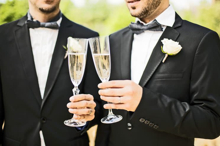 The grooms were shocked to be turned away by the photographer. (Photo: Getty Images)