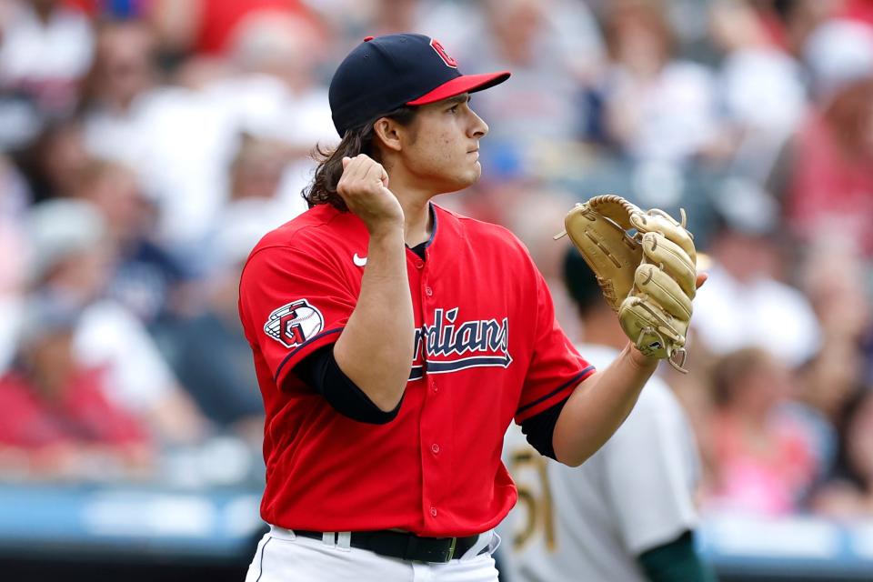 Cleveland Guardians relief pitcher Eli Morgan reacts after giving up a grand slam to Oakland Athletics' Seth Brown during the seventh inning of a baseball game Saturday, June 11, 2022, in Cleveland. (AP Photo/Ron Schwane)